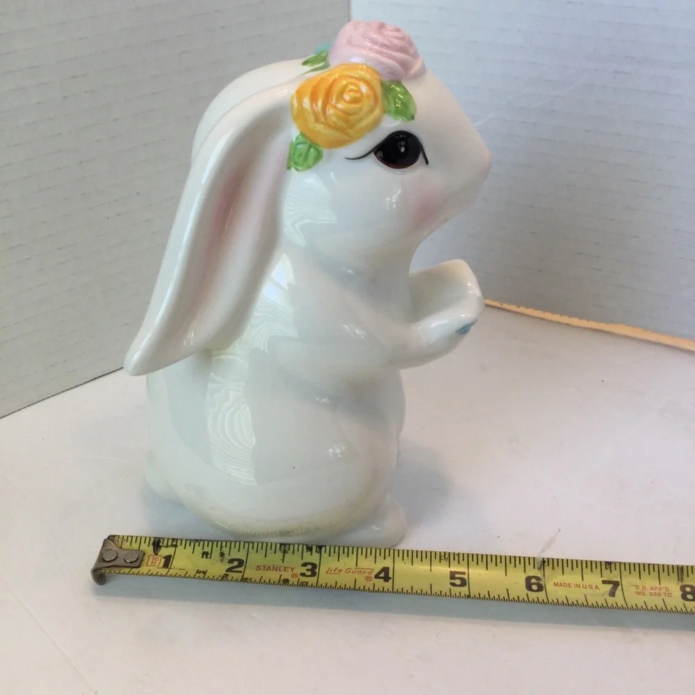 Ceramic Bunny Figurine holding book with Floral Accents
